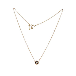 moissanite necklace with gold frame and black enamel finish