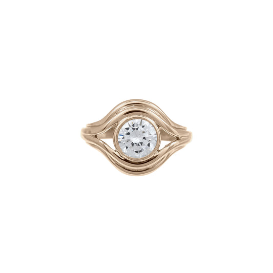 Gold pinky ring with a moissanite stone